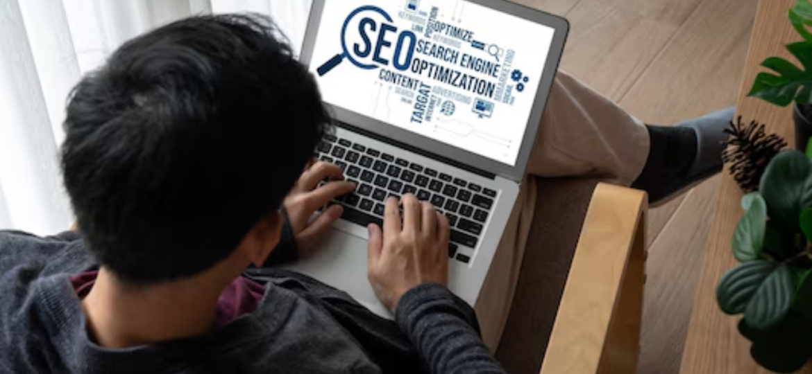 A man analyzing SEO keywords related to local seo versus traditional SEO strategies