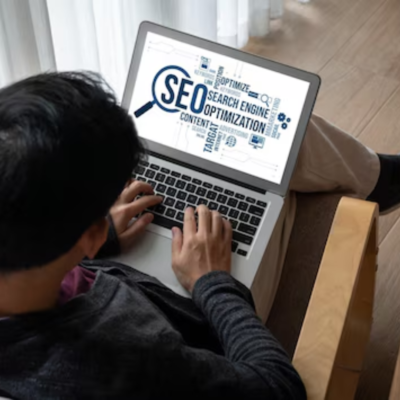 A man analyzing SEO keywords related to local seo versus traditional SEO strategies